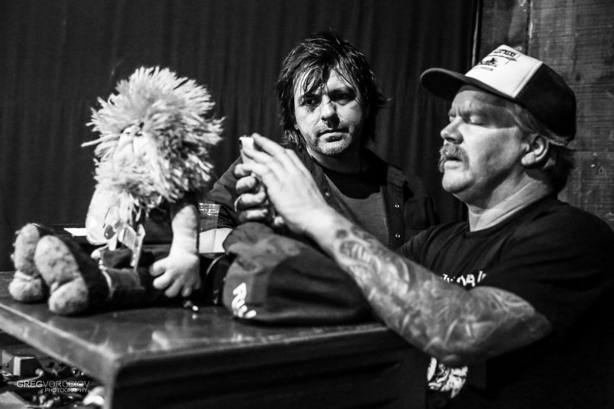 Longtime friends Nathan Dale and comedian Dean Delray together onstage at the Troubadour on August 12, 2015