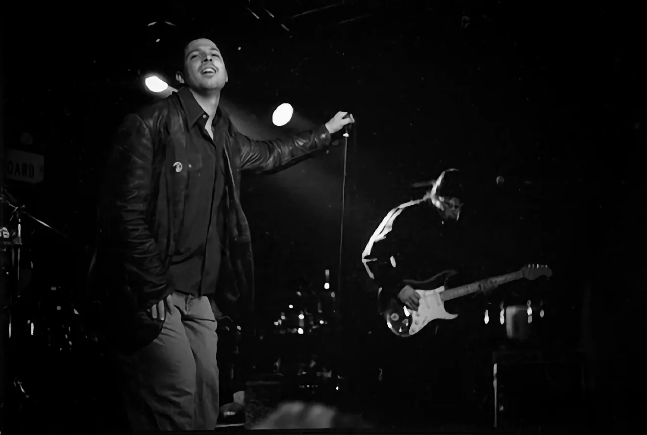 Hans Eberbach singing with Nathan Dale on guitar during Sweet Vine's official Columbia album release show at the El Dorado Saloon in Carmichael, California in 1997