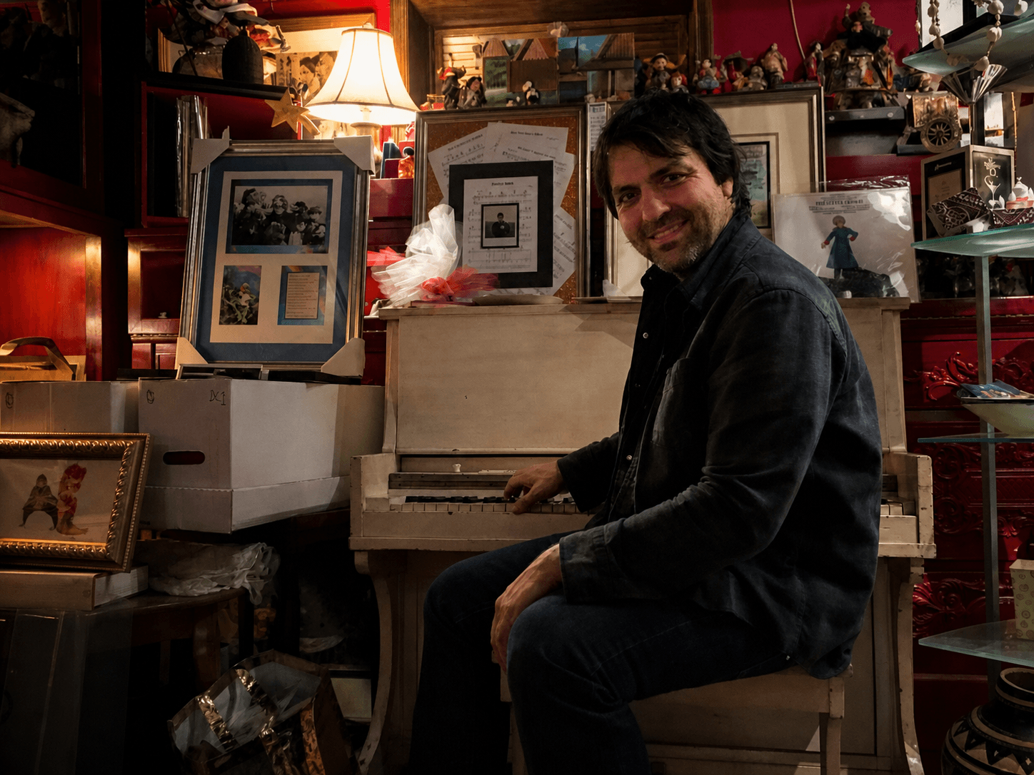 Nathan Dale seated at Paul Williams's piano inside O Museum in the historic Mansion on O Street, an arts and music haven in Washington, D.C., in 2016